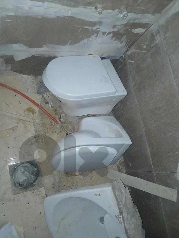 Backless toilet and sink  حمام مع مغسلة