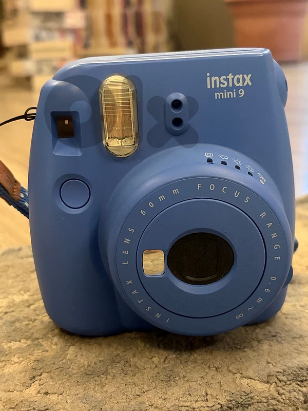 blue instax fujifilm camera