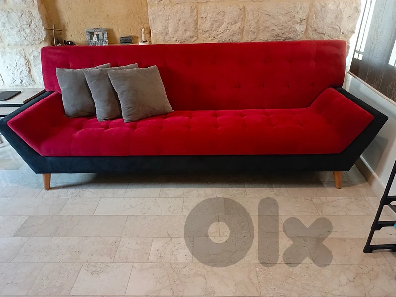 red and black long couch sofa