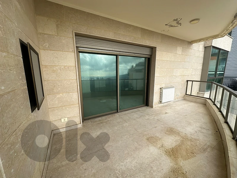 RWK131TF - Apartment for Sale in Ballouneh with garden & Sea View