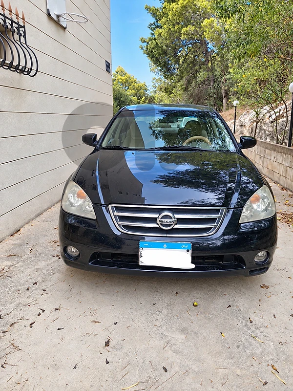 Nissan Altima (company source)(one owner only) Nissan Altima (company source)(one owner only)