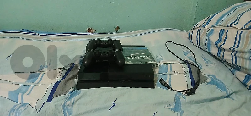 ps4 fat m3adal ma3 2 controller