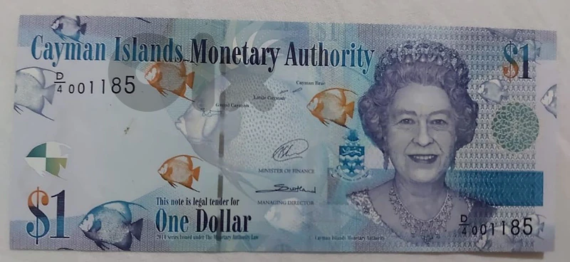 Cayman Island banknote about UNC Memorial for Queen Elizabeth II.