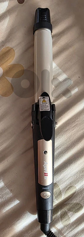 مكواة فرد الشعر ومكواة تجعيد الشعر. hair straightener/curling iron.