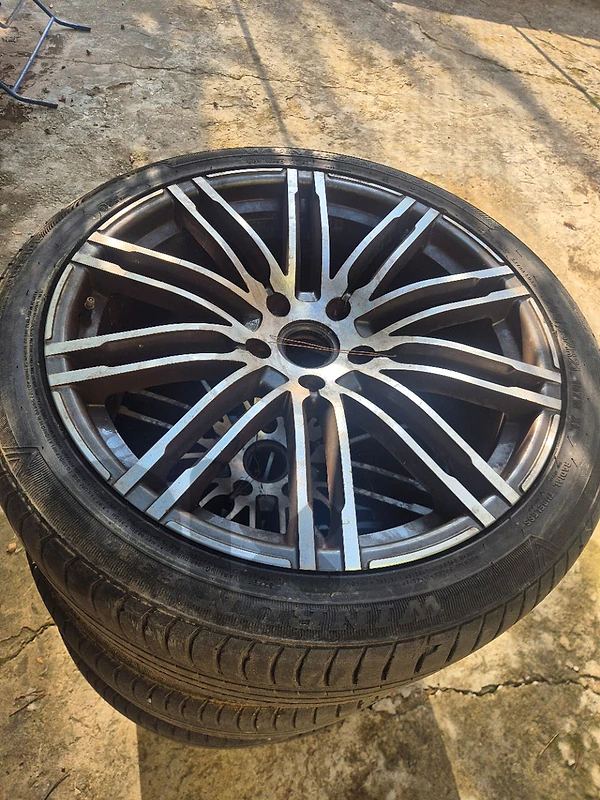 Porsche rims for sale including the old tyres on them