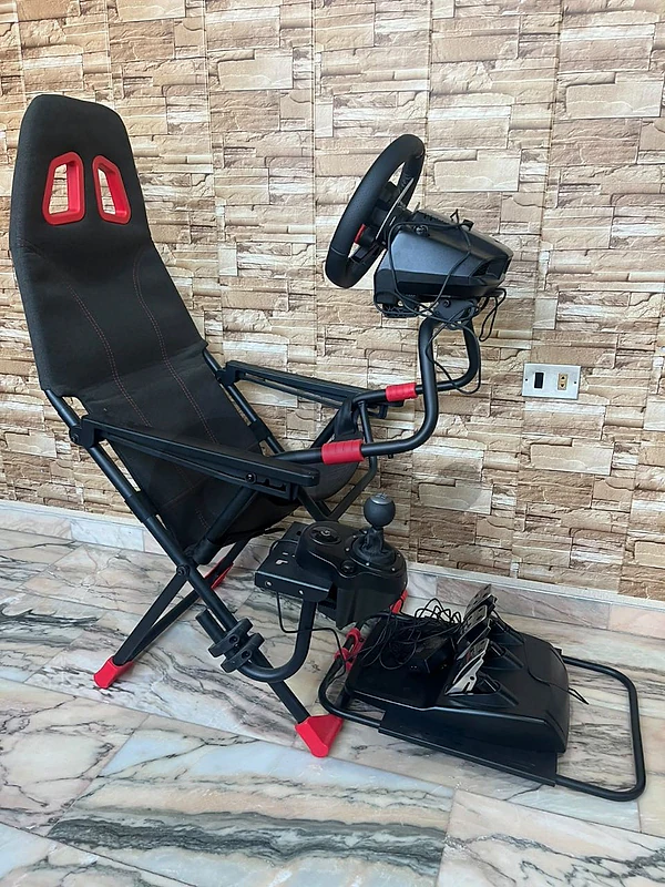 steering wheel logitech g29 + foladble playseat used