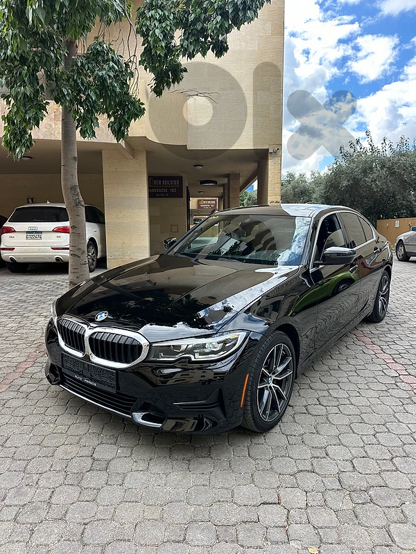 BMW 330i x-drive sport package 2020 black (clean carfax-45000 miles)