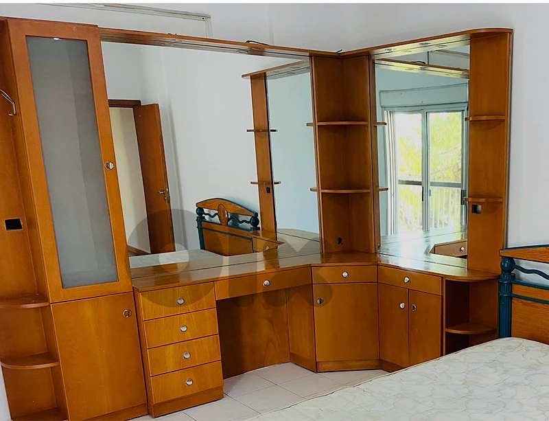 huge dresser with large mirror and many drawers