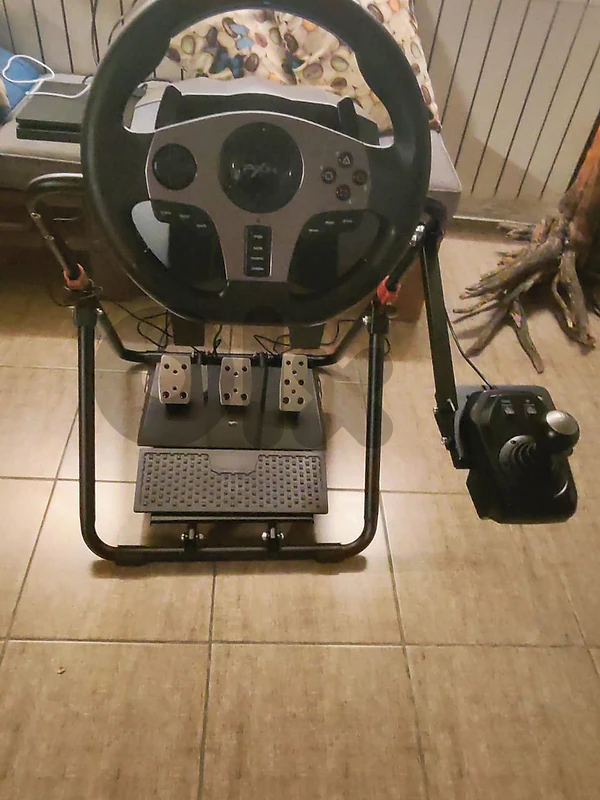 pxn v9 steering wheel and PS4 slim 500 gb all New for 430$