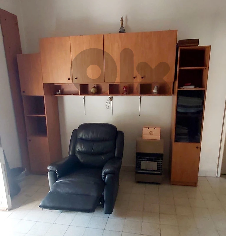 كرسي جلد بني بتفتح relax