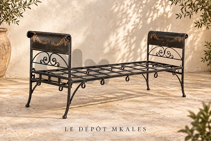This is an antique or vintage wrought iron garden This is an antique or vintage wrought iron garden