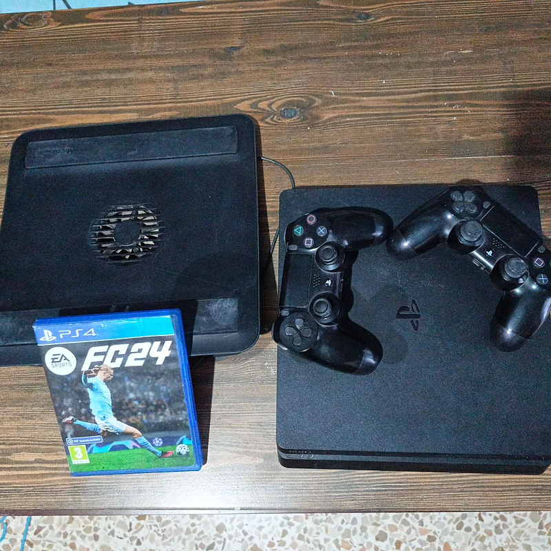 PS4 Slim + 2 Controllers + EA FC 24 Game & Cooling Pad