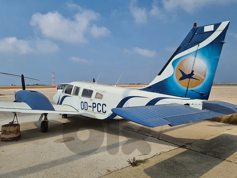 Blue & White Twin-Engine Aircraft Blue & White Twin-Engine Aircraft