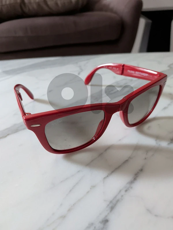 red Ray-Ban sunglasses