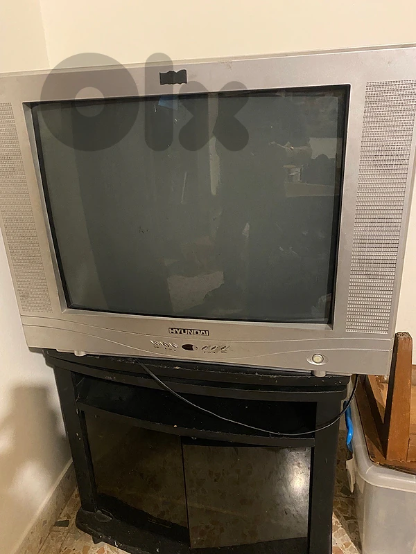 old tv with stand