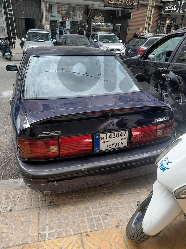 مازدا 323 1996 سيارة نظيفه موتير وفيتاس ممتاز حداده وبويا توب
