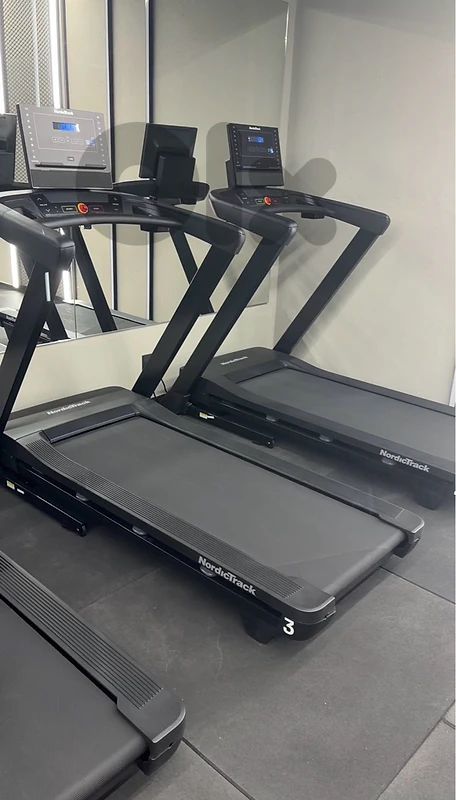 Two Nordic track treadmills