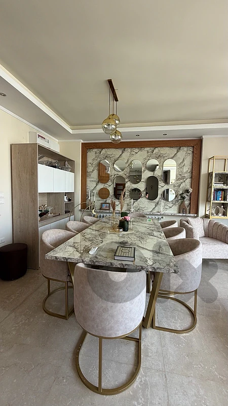 dinning room with chairs and cabinet