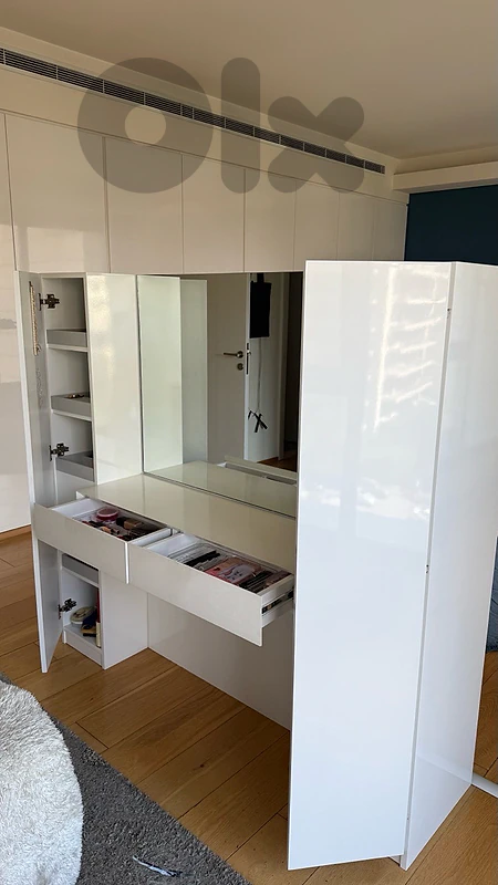 makeup and tv stand in one