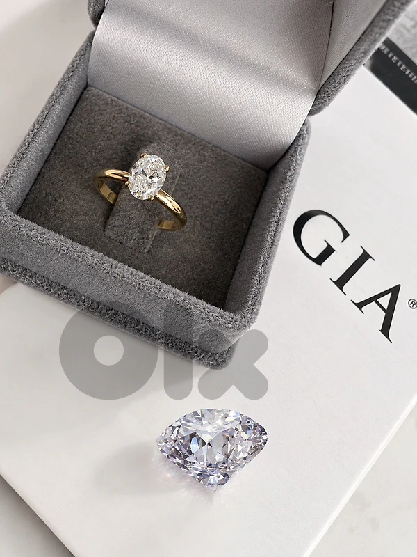 Oval diamond , engagement ring set in 18ct yellow gold