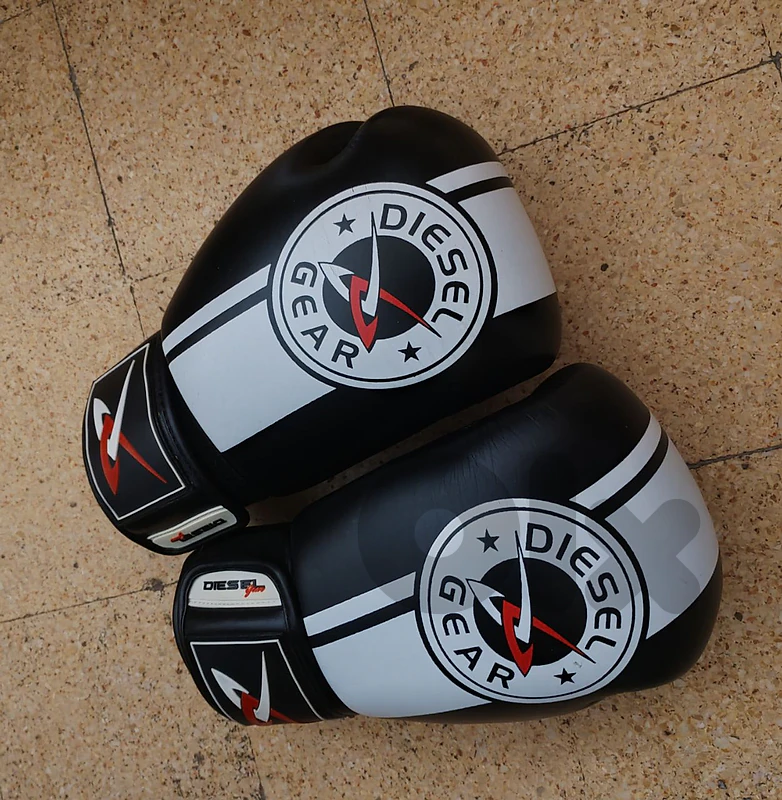 Boxing/MMA equipment: gloves, chin guards, and hand wraps