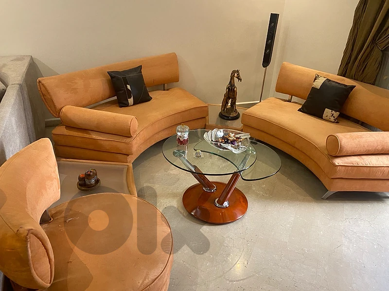 Italian Orange sofas set (doesnt include table)
