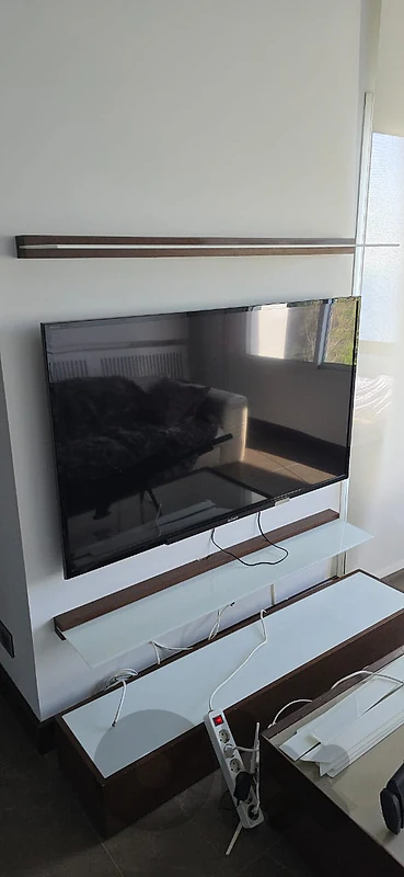TV with 2 shelves and a table TV with 2 shelves and a table