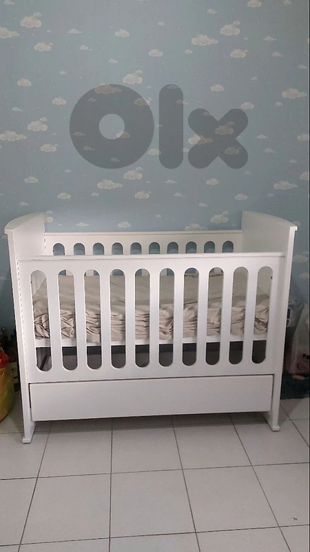 Bed with bedding and mattress