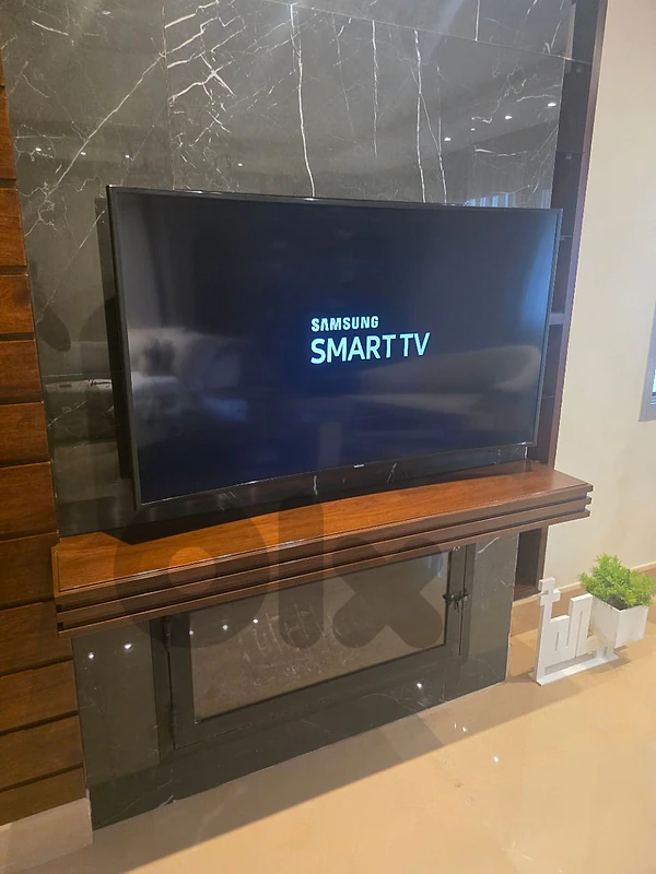 curved  samsung TV as new
