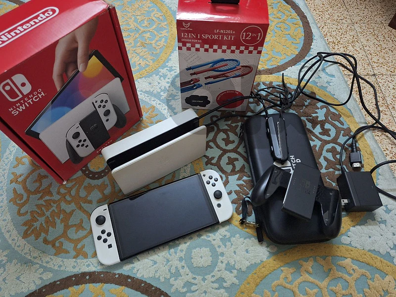nintendo switch oled with sports kit