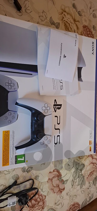 PS5 with original controller, wires, and box