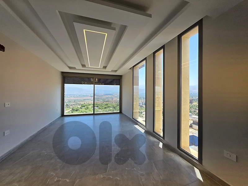 RWB200CC - Duplex for sale in Nakhleh- Koura with open mountain view