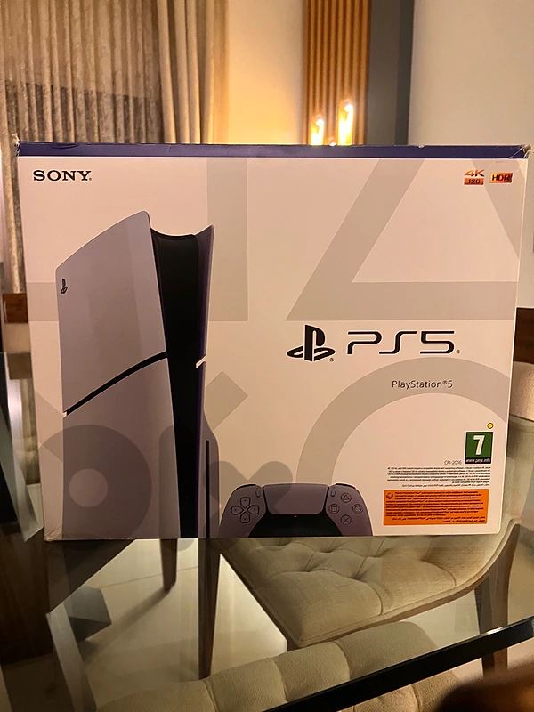 PS5 Slim 1TB Disc Edition (Like New) + 4 Games & Cooling Stand