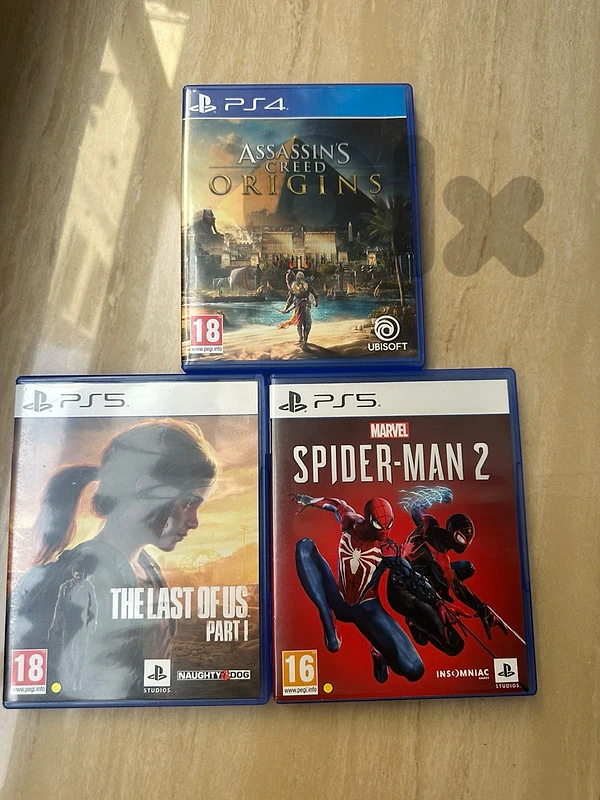 PS5 & PS4 3-Game Bundle (Spider-Man 2, TLOU Part I, AC Origins) PS5 & PS4 3-Game Bundle (Spider-Man 2, TLOU Part I, AC Origins)