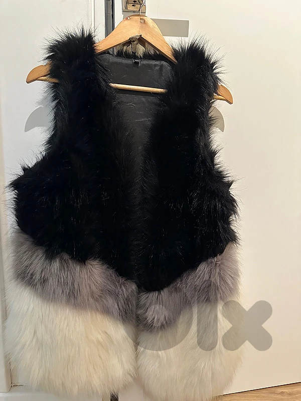 sleeveless fur coat