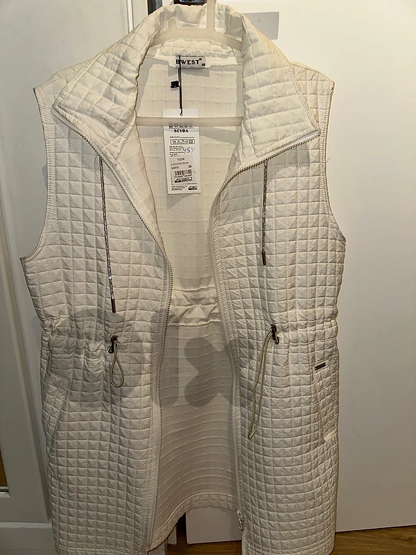 sleeveless white jacket