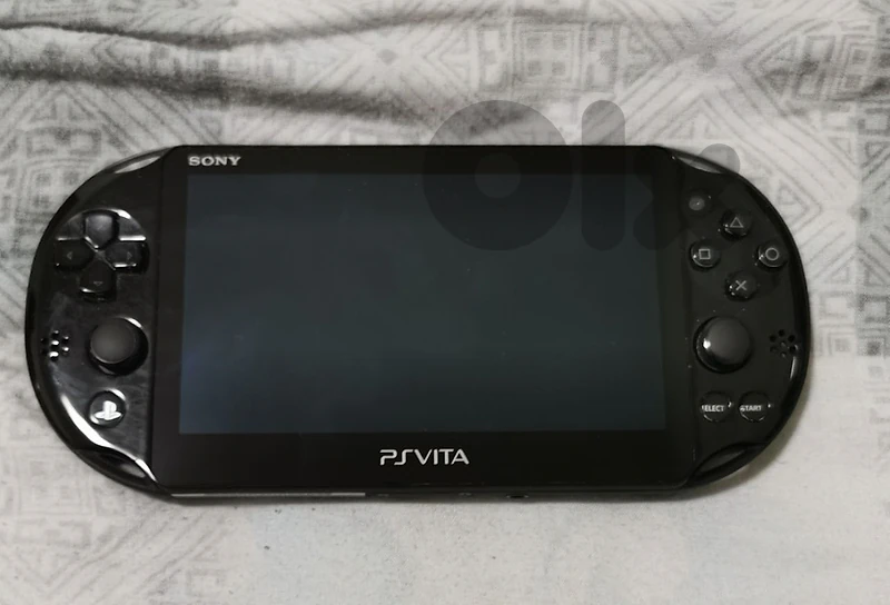 PS Vita Slim Excellent Condition