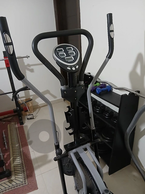 weight bench , iron plates and elliptical for sale