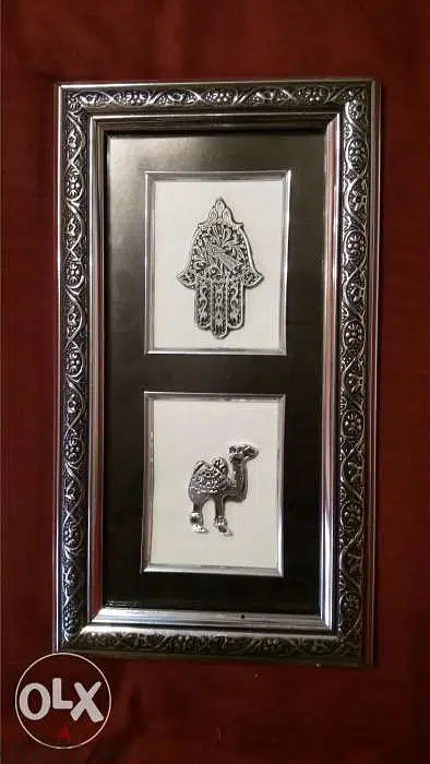 hand of fatima and tree and camels