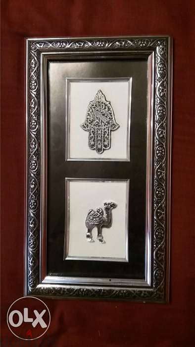 hand of fatima and tree and camels 0