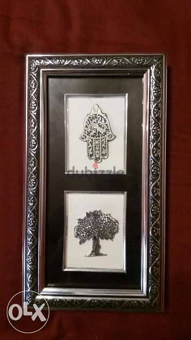 hand of fatima and tree and camels 1