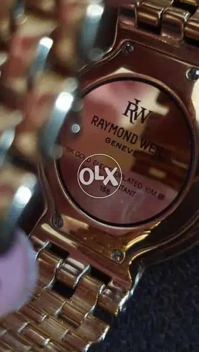 Raymond Weil 18K Gold Electroplated Broken Glass ( Negotiable Price )