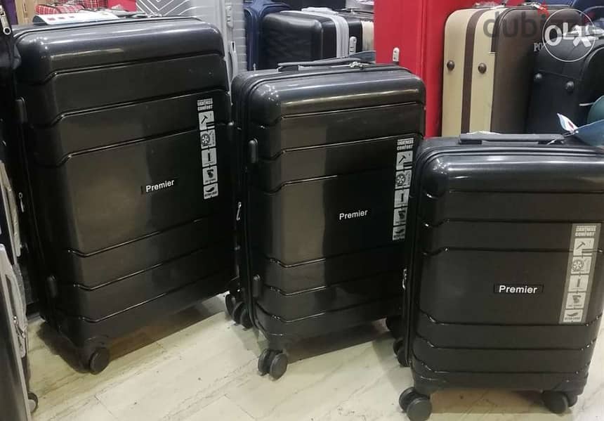 Polycarbonate unbreakable premier swiss suitcases luggage 76-969O37 0