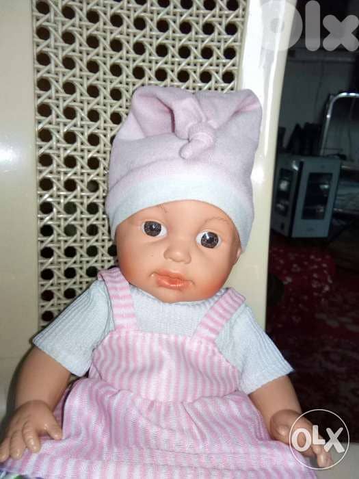 BABY GIRL makes VOICES MEDIUM toy 30 Cm Lebanon made has a disc=14$ 1