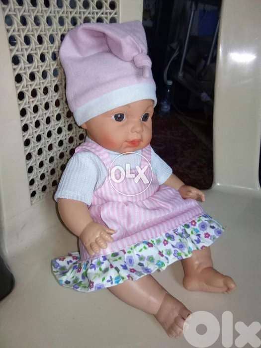BABY GIRL makes VOICES MEDIUM toy 30 Cm Lebanon made has a disc=14$ 2