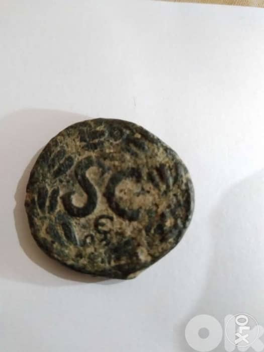 Ancient Roman Bronze SC Coin For Emperor Trajan year 198 AD 0