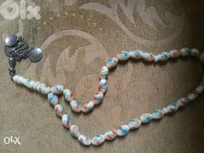 مسبحة عضم مطعمة فيروز و سندلس نادرة صناعة يدوية قديمة و مميزة جدا
