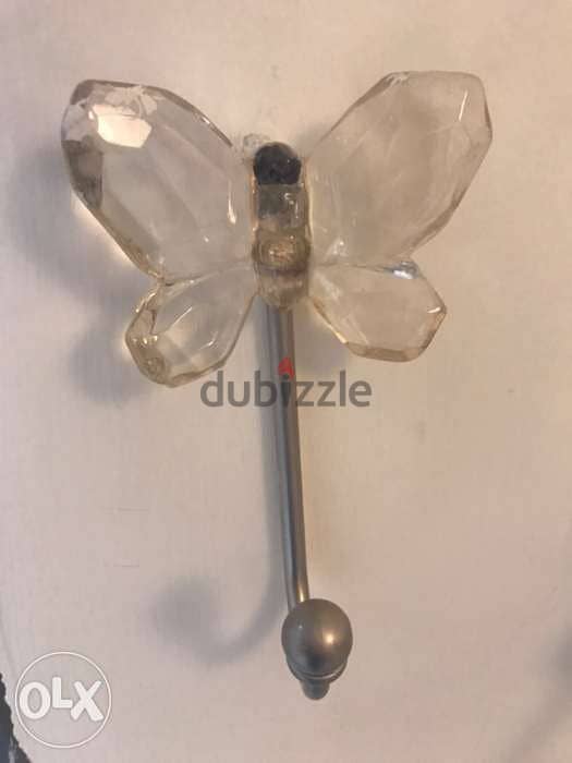 pottery barn 2 curtain holders and one door/wall hook 1