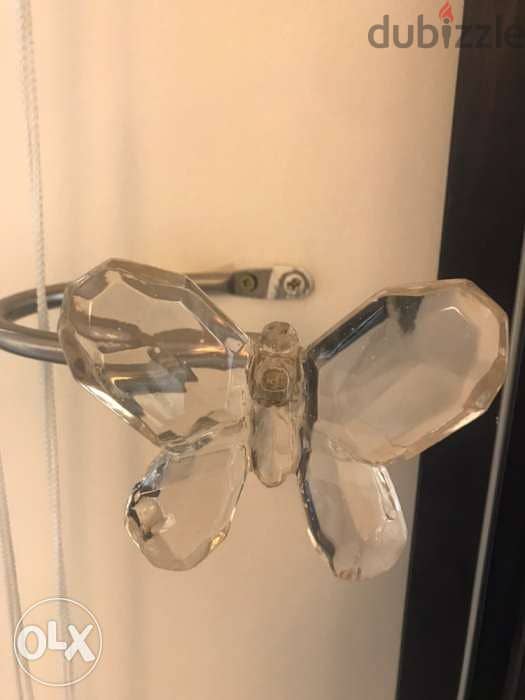 pottery barn 2 curtain holders and one door/wall hook 2