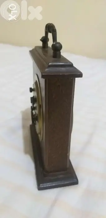 antique manual winding table clock